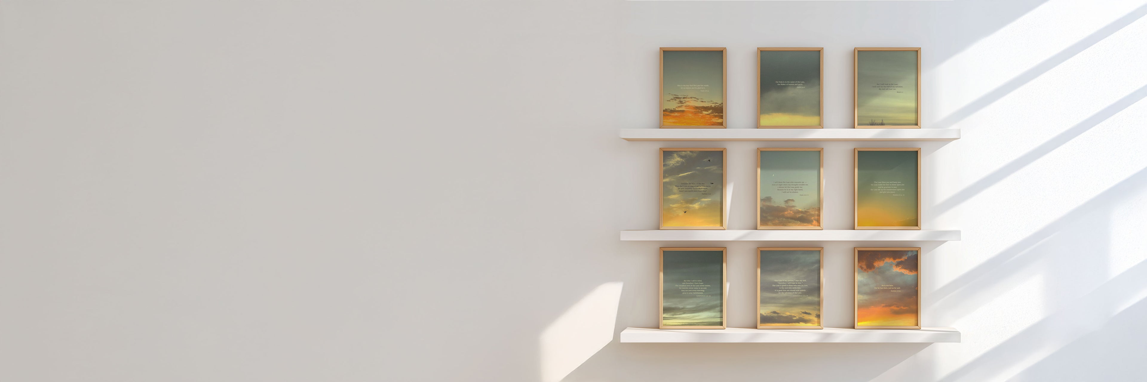 Framed Scripture art prints on a white shelf against a light wall for desktop header.